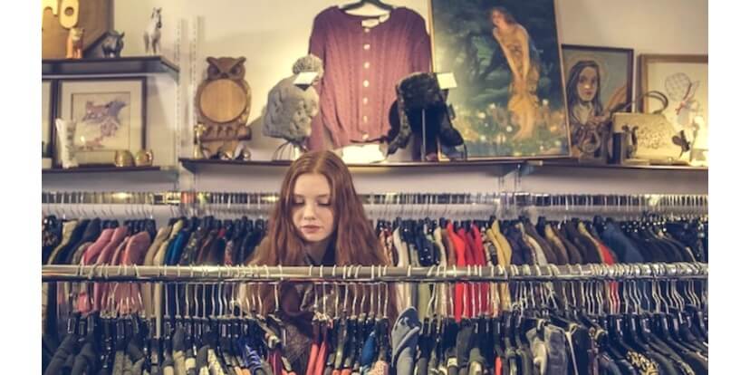 A woman in a vintage clothing boutique