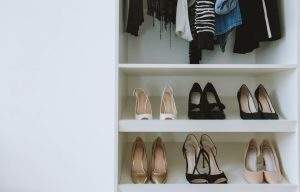 A shelf with heels representing one of the shoe storage solutions for fashion enthusiasts.